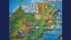 Dinosauři a prehistorický svět - dětská nástěnná mapa 136 x 96 cm v zeleném hliníkovém rámu